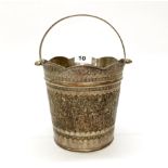 A Continental silvered and hammered copper ice bucket, H. 22cm.