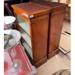 A pair of reproduction mahogany veneered bookcases, 63 x 97cm.