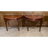 A pair of Demi Lune inlaid mahogany side tables, W. 104cm.