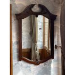 An antique style mahogany framed mirror, H. 90cm.