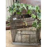 A decorative metal birdcage, H. 57cm.