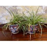 A pair of 19th century Japanese Imari planters, Dia. 29cm.