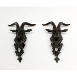 A pair of 19th century bronze goat head vase or furniture mounts, H. 14cm.