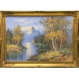 A gilt framed oil on canvas depicting a mountain scene, signed G. Whiting, frame size 75 x 105cm.