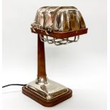 A contemporary metal and leather desk lamp, H. 37cm.