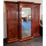 A 19th century mahogany veneered triple wardrobe, 200 x 202cm.