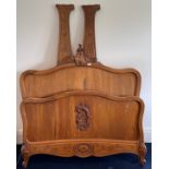 A 19th century French carved walnut bedframe with headboard, footboard and two siderails, frame W.