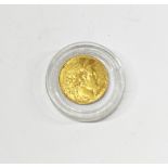 A French 1899 gold ten franc coin.