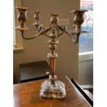 A large silver plate on copper candelabrum, H. 47cm.