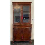 A very pretty 19th century flame mahogany veneered bookcase over cabinet, W. 91cm, H. 196cm.