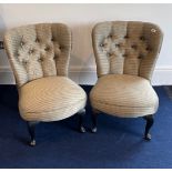 A pair of button backed upholstered cabriole legged nursing chairs, H. 77cm.