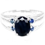 A 925 silver ring set with oval and round cut sapphire, (N).