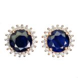 A pair of 925 silver rose gold gilt cluster earrings set with sapphires and white stones, Dia. 1.