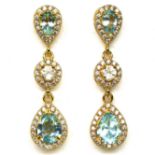 A pair of 925 silver drop earrings set with round and pear cut Swiss blue topaz, L. 3.2cm.