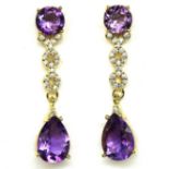 A pair of 925 silver gold gilt drop earrings set with pear cut amethysts and white stones, L. 3.