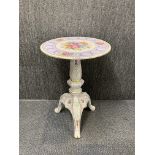 A 19th/ early 20th century continental porcelain wine table, Dia. 47cm, H. 68cm. (Restored top and