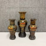 A group of three hand painted oriental lacquered wooden vases, tallest H. 38cm. One A/F.