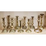 A group of 19th century brass candlesticks, tallest H. 24cm.