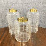 Three large cut glass jars and lids, H. 35cm.