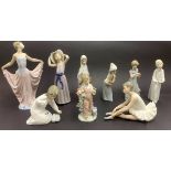 A group of eight Lladro porcelain figurines, together with a Nao porcelain ballerina, tallest H.