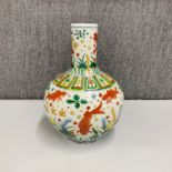 An impressive large Chinese hand painted porcelain vase decorated with fish, H. 38cm.