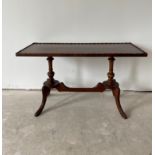 A regency style mahogany veneered double pedestal coffee table, 94 x 41 x 55cm.