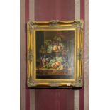 A large gilt framed reproduction oil on canvas still life fruit, frame size 73 x 81cm.