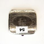 A heavy Tiffany & Co gilt lined silver cigarette case with amethyst set button and Art Nouveau