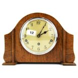 A 1930's oak Westminster chiming mantle clock, H. 22cm, W. 31cm. (Recently serviced at a cost of £