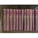 Twelve leatherbound volumes 'Works of Sir Walter Scott' published by Macmillan and co 1905, H. 17.