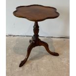 A good quality reproduction Georgian style mahogany wine table with bird claw feet, W. 50cm. H