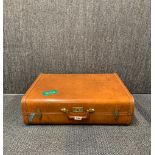 A vintage leather suitcase, 62 x 20 x 50cm.