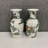 A pair of Chinese hand painted porcelain vases, H. 43cm. Six character mark to base.