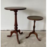 A mahogany pedestal wine table, Dia. 44cm. H. 71cm. together with a smaller leather topped