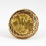 A 9ct yellow gold mounted half sovereign ring, c. 1925, (K.5).