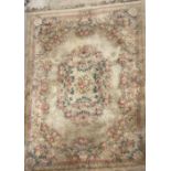 A large Chinese washed wool carpet, 275 x 380cm.