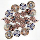 A quantity of oriental porcelain plates, largest dia. 30cm.