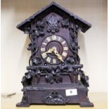 A 19th century Black Forest cuckoo clock, H. 36cm.
