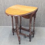 A 1930's oak barely twist oak drop leaf tea table, 73 x 59 x 86cm (extended)