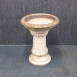 A concrete garden bird bath, 55 x 42cm.