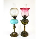 A 19th century brass and blue opaline glass oil lamp with frosted glass shade, together with a
