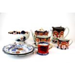 A group of English 19th century porcelain items, decorated in Imari colours.