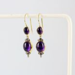 A pair of 925 silver gilt drop earrings with 9ct yellow gold hoops, set with cabochon cut amethyst