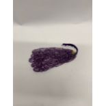 A quantity of 12 jewellers stock strands of graduated faceted amethyst beads, largest bead L.