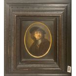 A 19th century framed portrait on board of and after Rembrandt, frame size 45 x 4cm.