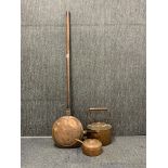 A large early copper handled warming pan, L. 136cm, together with a large copper kettle and a