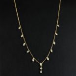 An 18ct yellow gold (stamped 750) necklace set with marquise cut diamonds, L. 44cm, approx. 3.86ct.