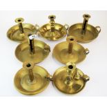 A group of seven 19th century brass chamber sticks, tallest H. 14cm.