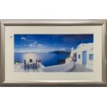 A large framed photograph of the Greek islands, 66 x 113cm.