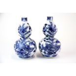 A pair of Chinese gourd shaped handpainted porcelain vases, H. 19cm.